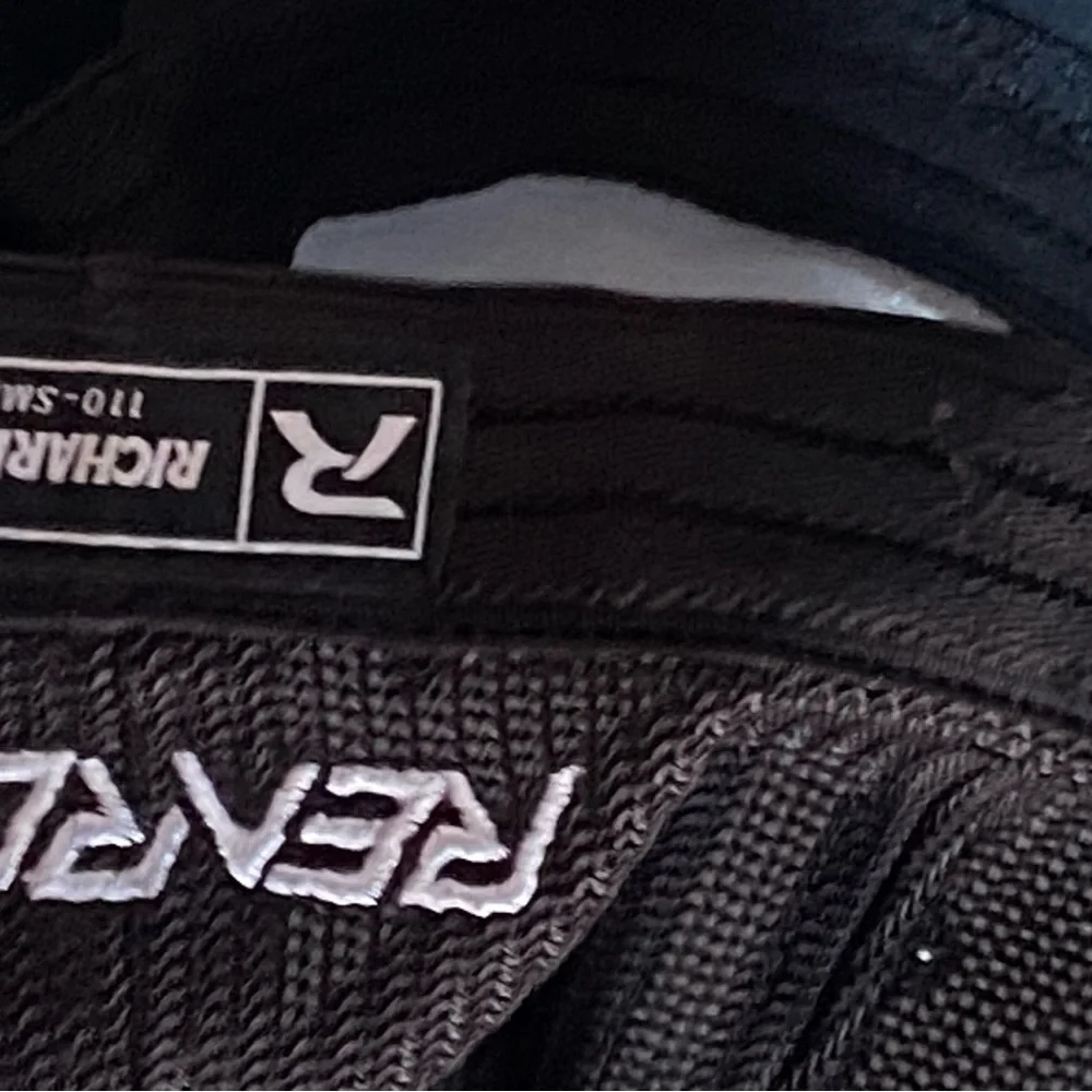 Richardson Black Logo Mesh Trucker Hat